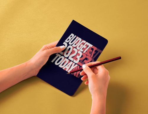 Hands-Holding-Notebook-and-Pencil-psd-Mockup